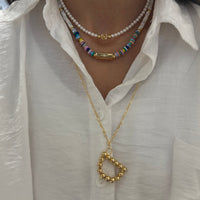 SYMBOLISM PEARL NECKLACE