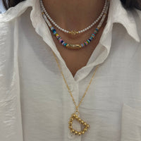 SYMBOLISM PEARL NECKLACE