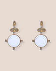 d-by-dalia-jewelry circular drop earrings featuring white discs, faceted neutral stones, and gold-tone crystal accents