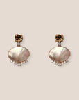 d-by-dalia-jewelry oval drop earrings with iridescent mother-of-pearl, champagne crystals, and gold-toned settings.