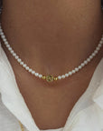 SYMBOLISM PEARL NECKLACE