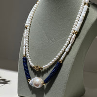 SYMBOLISM PEARL NECKLACE