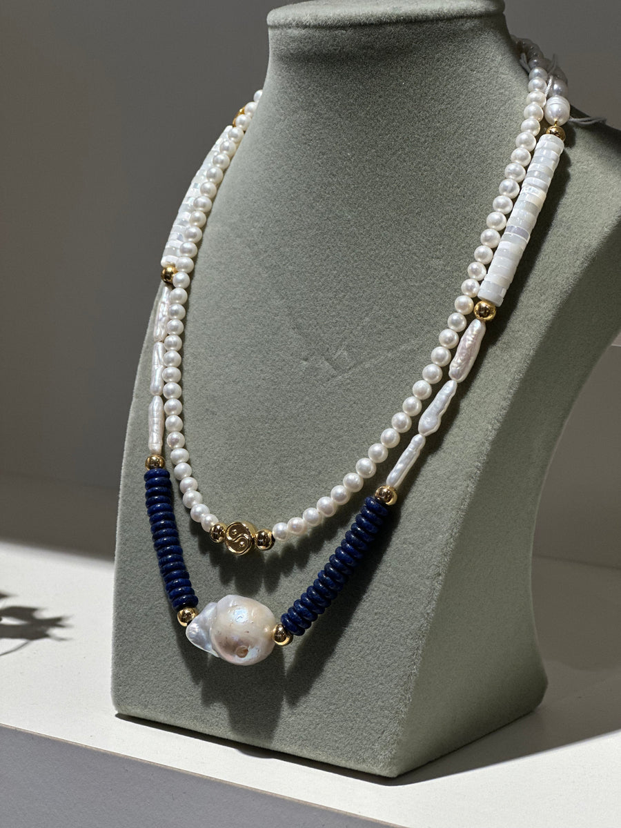 SYMBOLISM PEARL NECKLACE