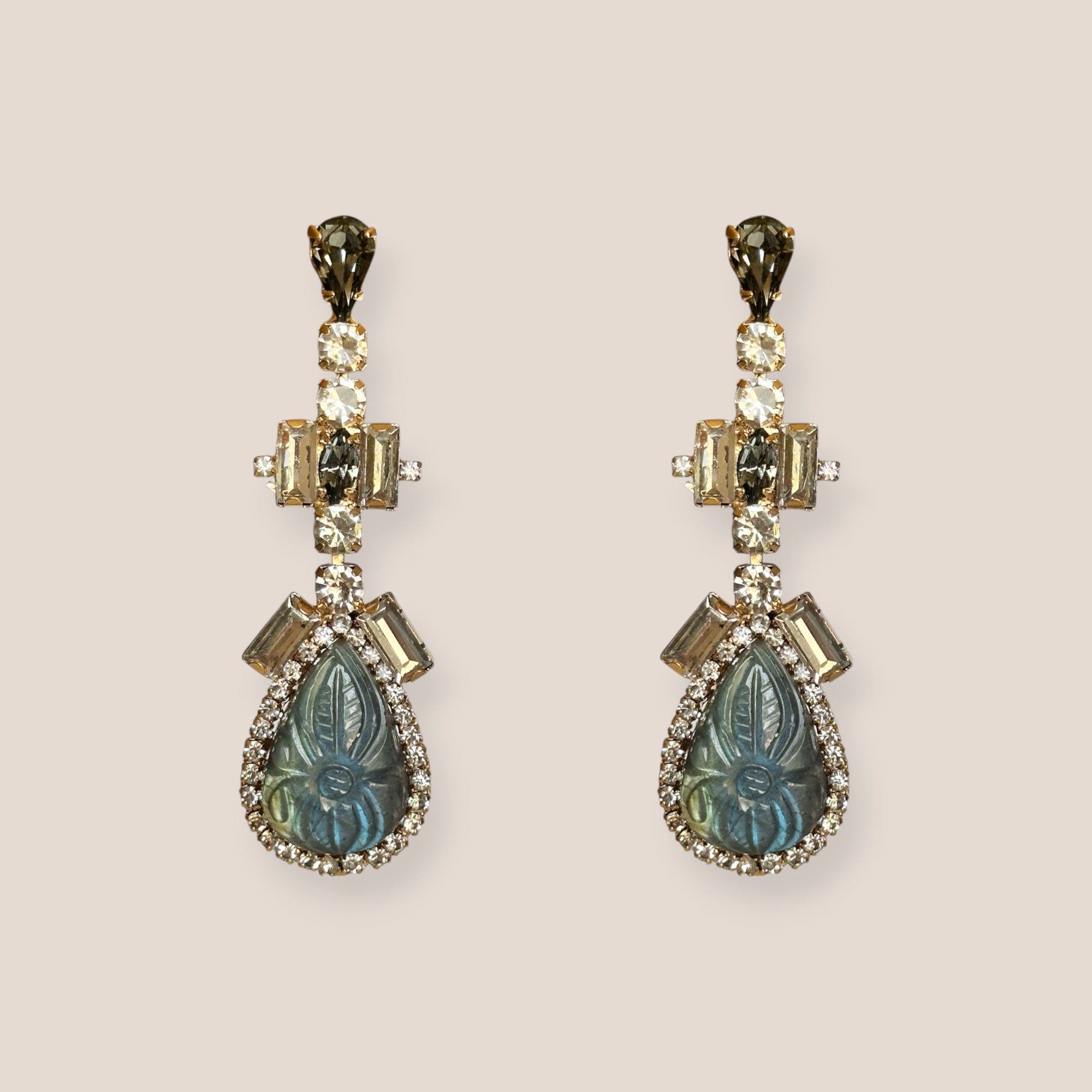 d-by-dalia-jewelry statement drop earrings with carved teardrop gemstones, crystal halo, and metallic setting.