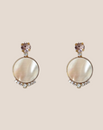 d-by-dalia-jewelry gold-toned round drop earrings with mother-of-pearl inlay, crystal accents, and stud backings.