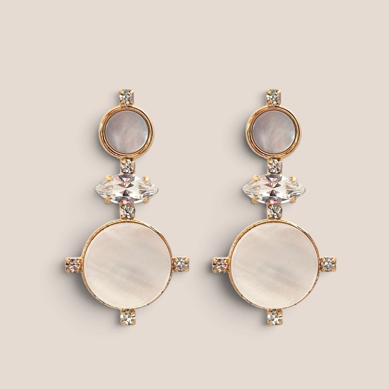d-by-dalia-jewelry gold-toned drop earrings with iridescent mother-of-pearl inlays and sparkling crystal accents.