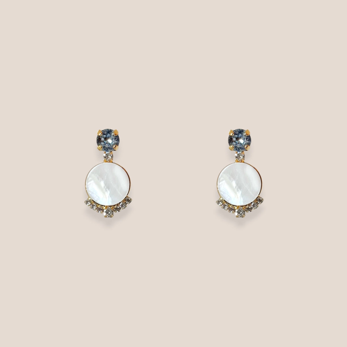 d-by-dalia-jewelry round drop earrings with mother-of-pearl, blue crystal studs, and clear pavé crystal accents.